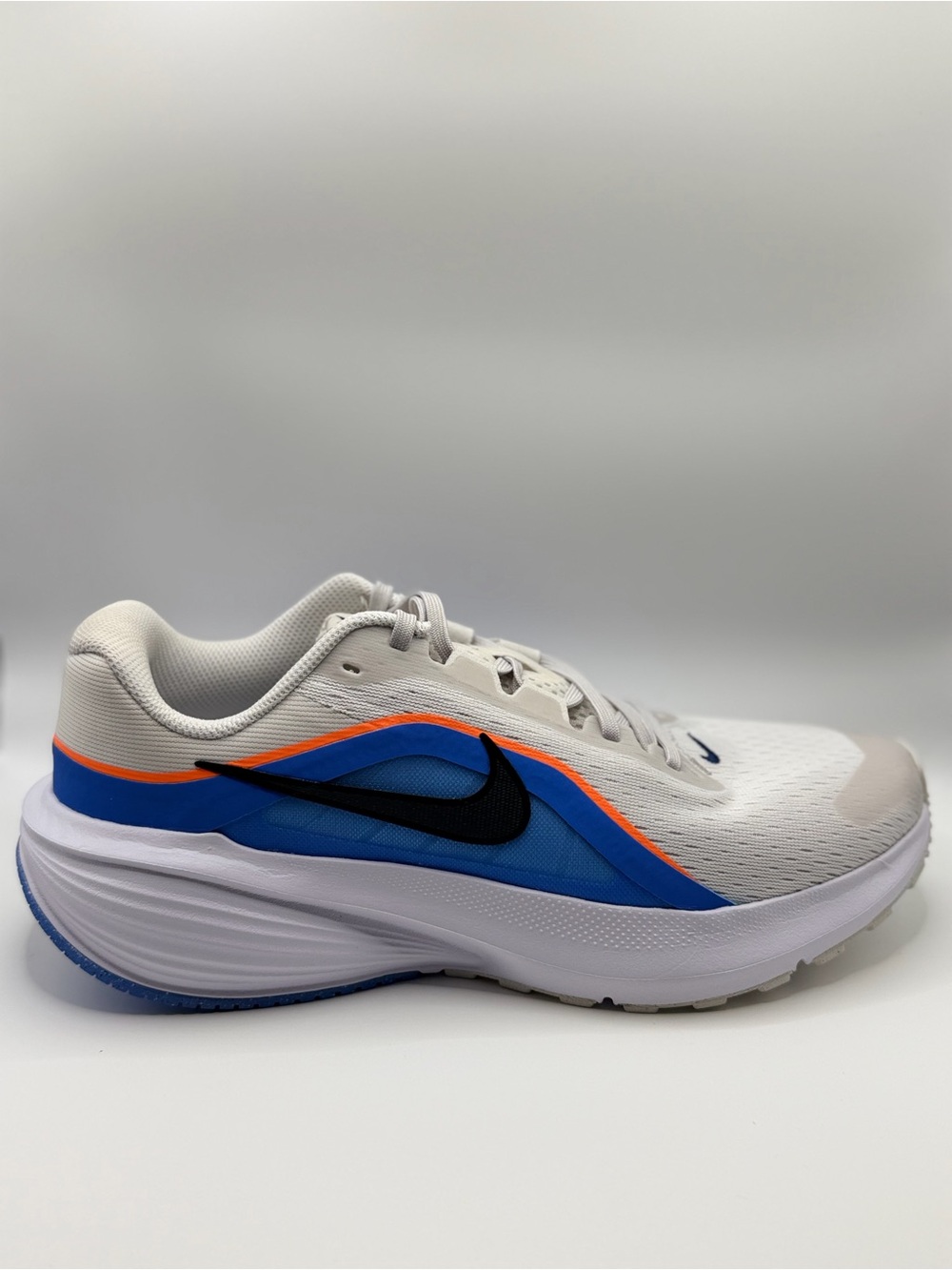 Nike Men’s White Blue Orange Running Shoe with Black Swoosh